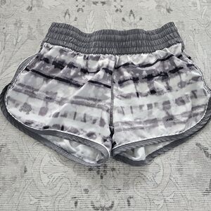Women's size small under armour running shorts grey white black tie dye.